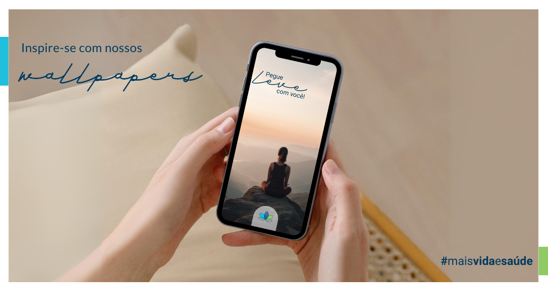 Pessoa segurando um celular que exibe um wallpaper motivacional com a frase "Pegue leve com você!" e o logo da Affix. Ao fundo, há uma imagem de uma pessoa meditando em um cenário natural, com montanhas ao entardecer. O texto ao lado diz: "Inspire-se com nossos wallpapers." e a hashtag #maisvidaesaude aparece no canto inferior direito.